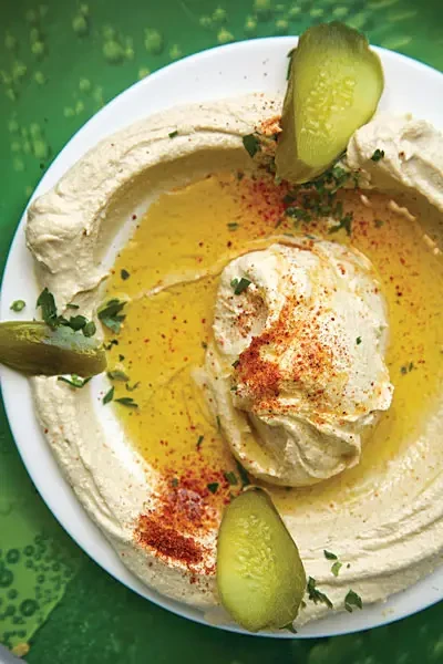 Middle Eastern mezze spread with hummus and small plates